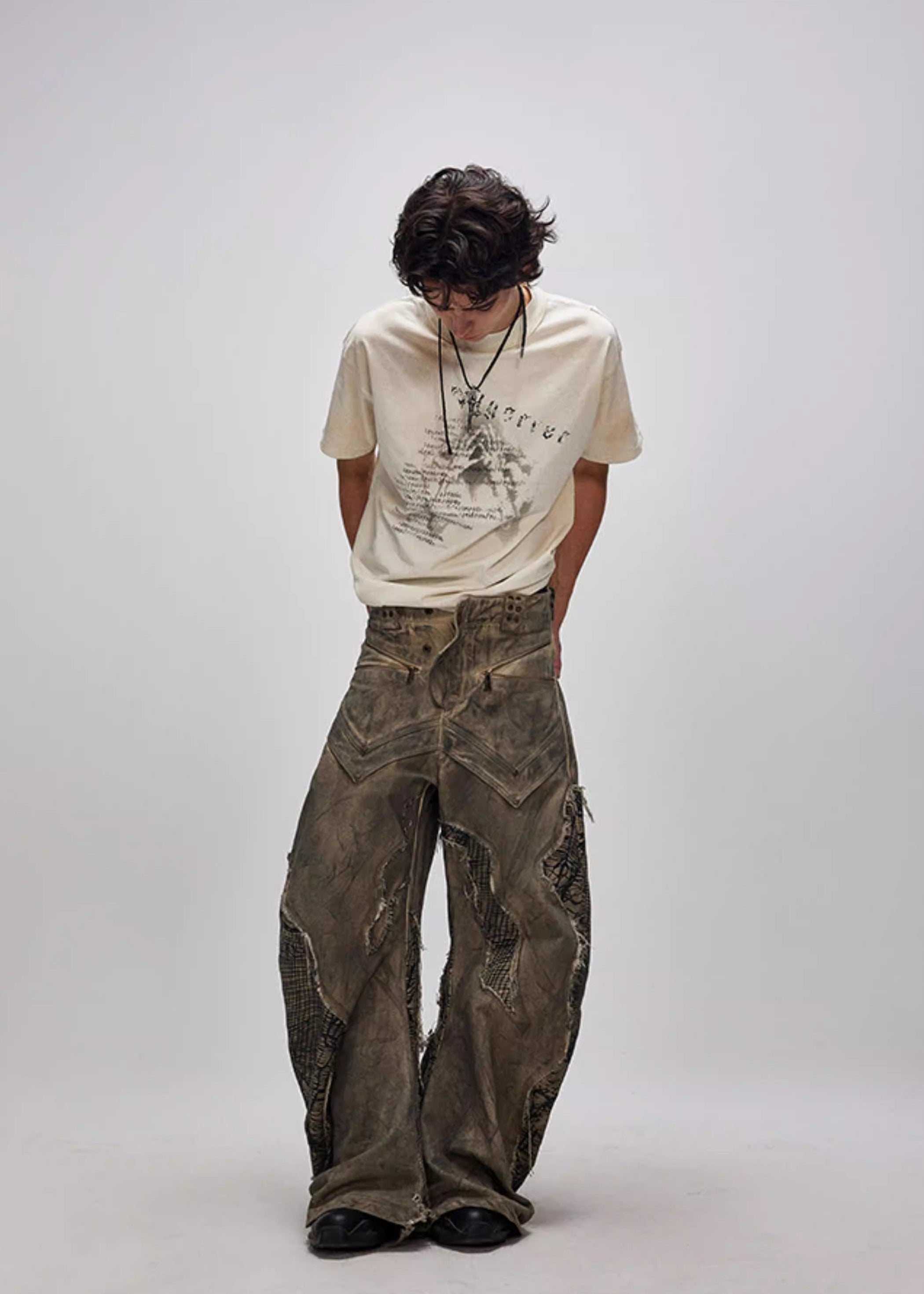 FLYERRER 24AW Original "Mutation" Series Irregular Ripped Patchwork Curved Leg Pants FR213