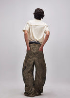 FLYERRER 24AW Original "Mutation" Series Irregular Ripped Patchwork Curved Leg Pants FR213