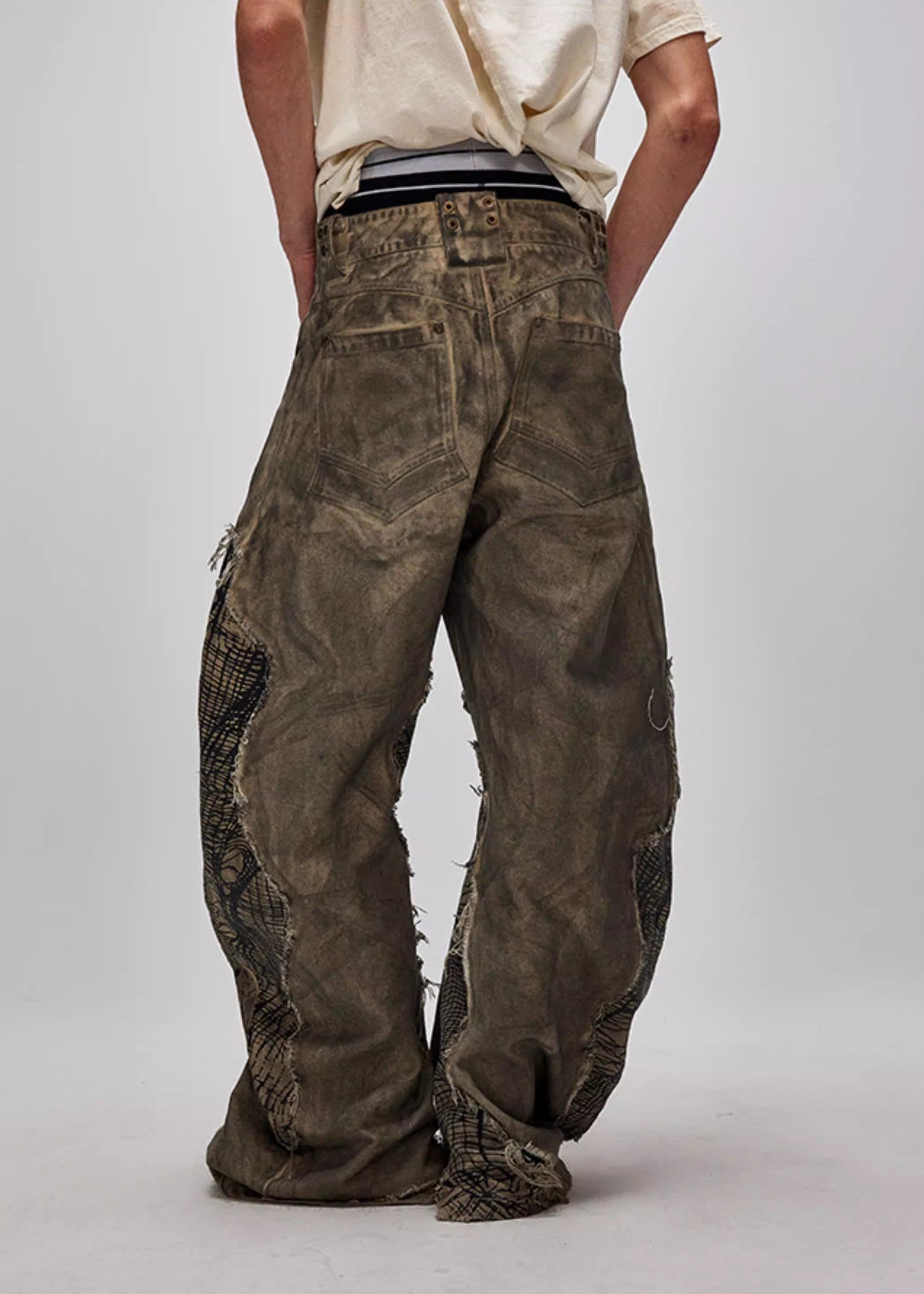 FLYERRER 24AW Original "Mutation" Series Irregular Ripped Patchwork Curved Leg Pants FR213