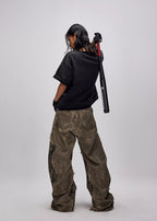 FLYERRER 24AW Original "Mutation" Series Irregular Ripped Patchwork Curved Leg Pants FR213